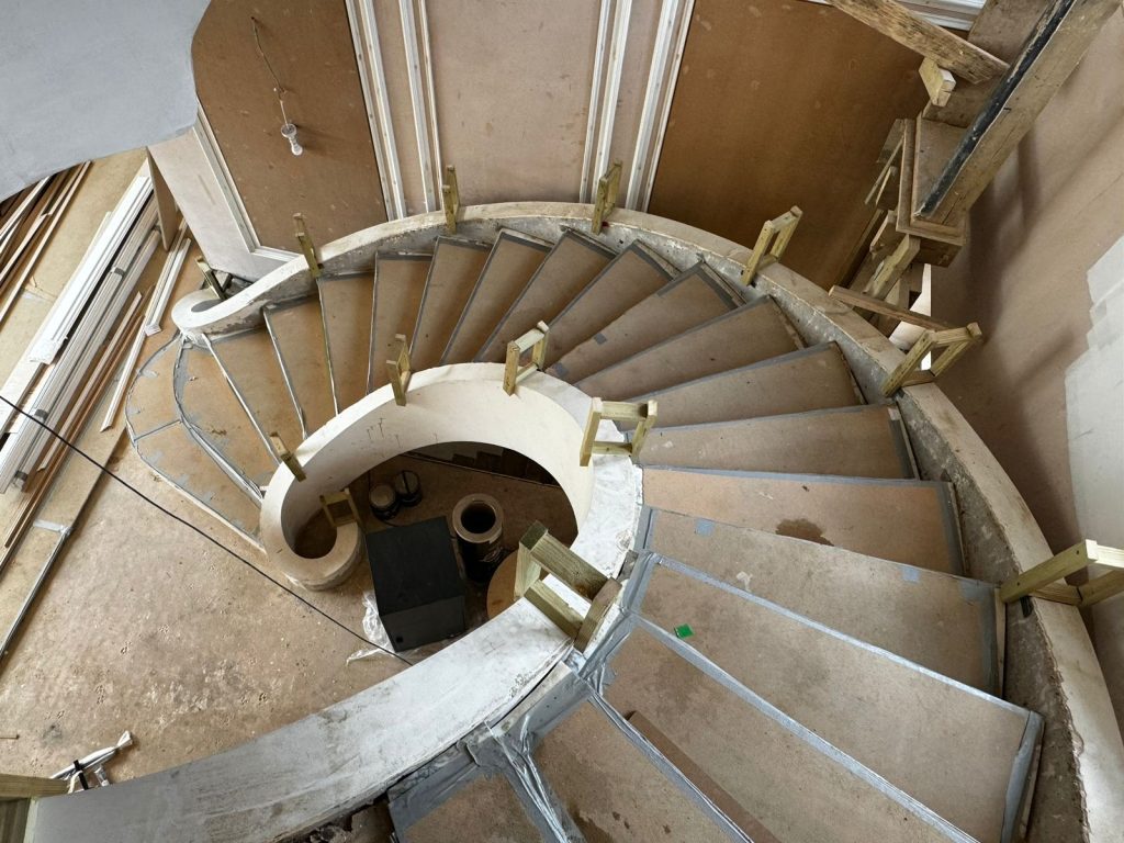 A twisted staircase during installation